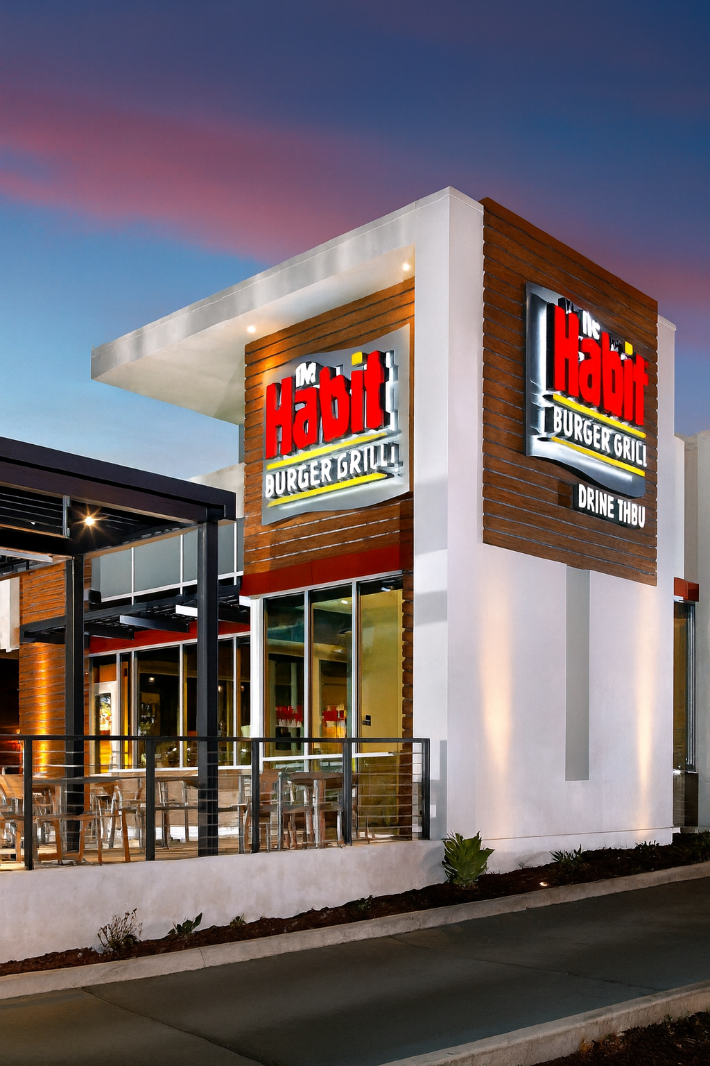 Close-up of an exterior halo-illuminated channel letter on The Habit Burger Grill Bonney Lake building fabricated by Plumb Signs