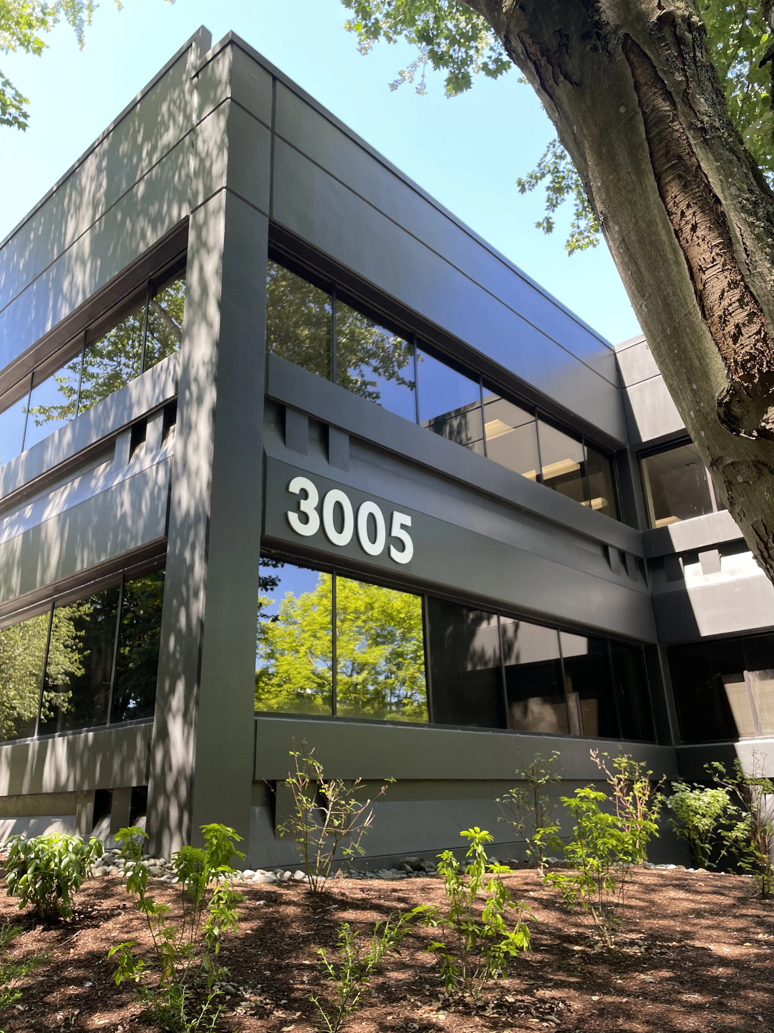 Timber Ridge Bellevue dimensional address numerals &mdash; building-mounted aluminum address numbers at the property in Bellevue, Washington, fabricated and installed by Plumb Signs of Tacoma
