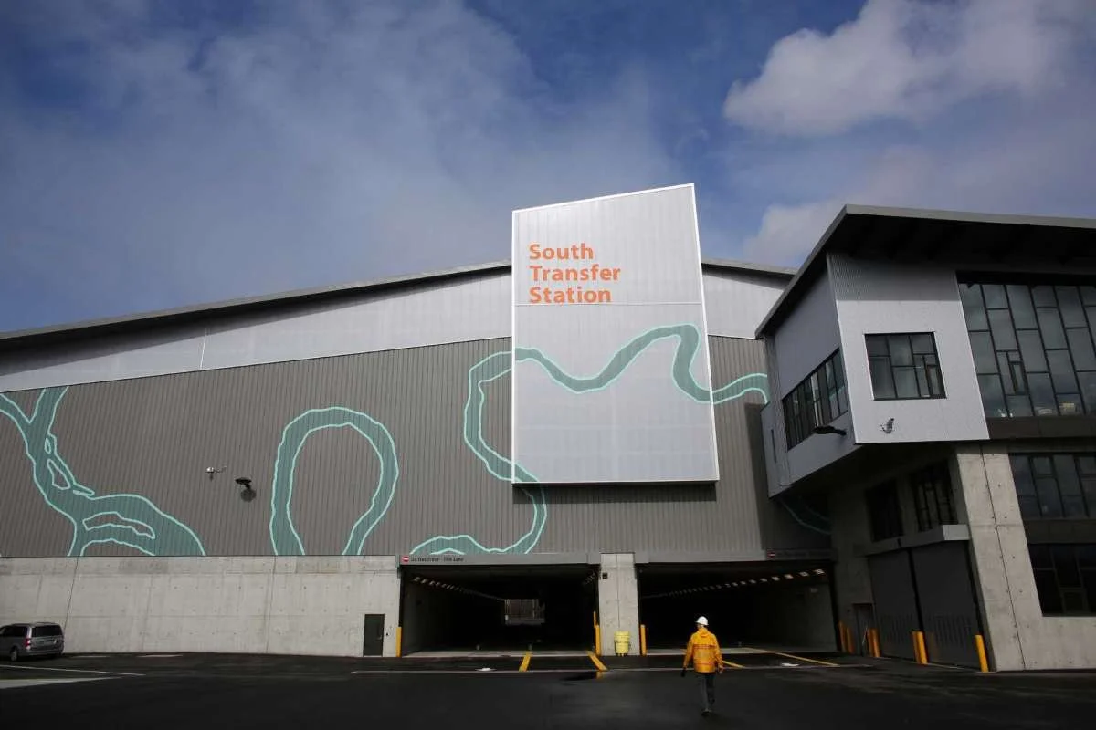 Experiential graphic wall with layered brand textures at a public venue