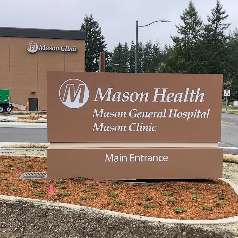 Mason Health main entrance monument sign in Shelton, WA — adjacent Thurston–Mason County proof of Plumb Signs healthcare wayfinding work twenty minutes northwest of Olympia