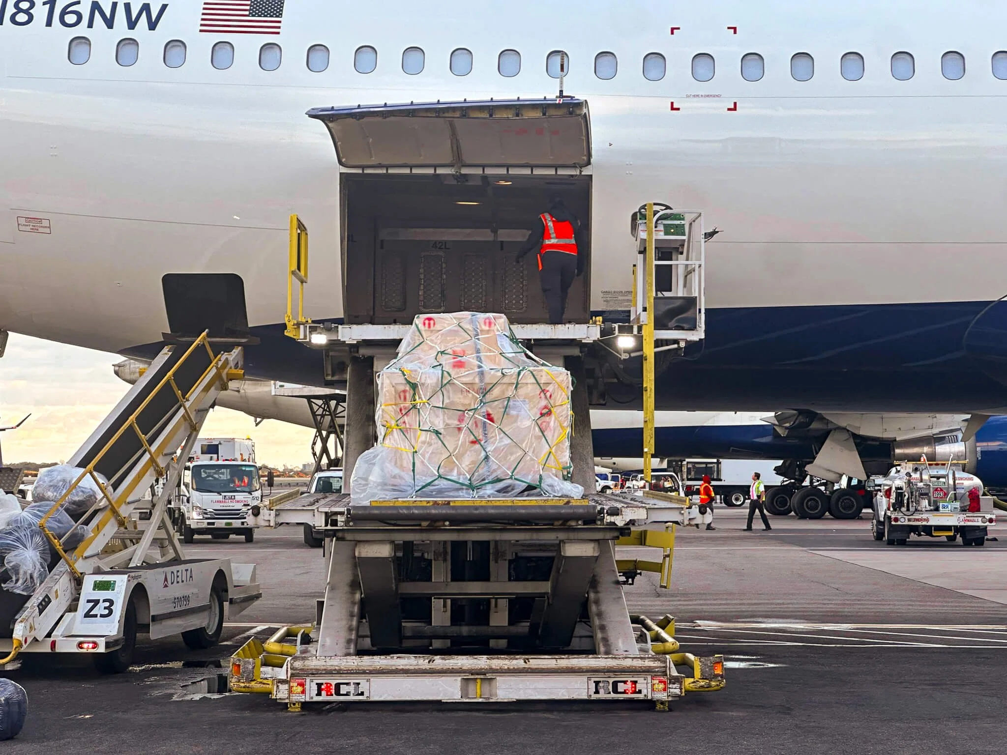 Fine art shipment being loaded onto an international cargo plane