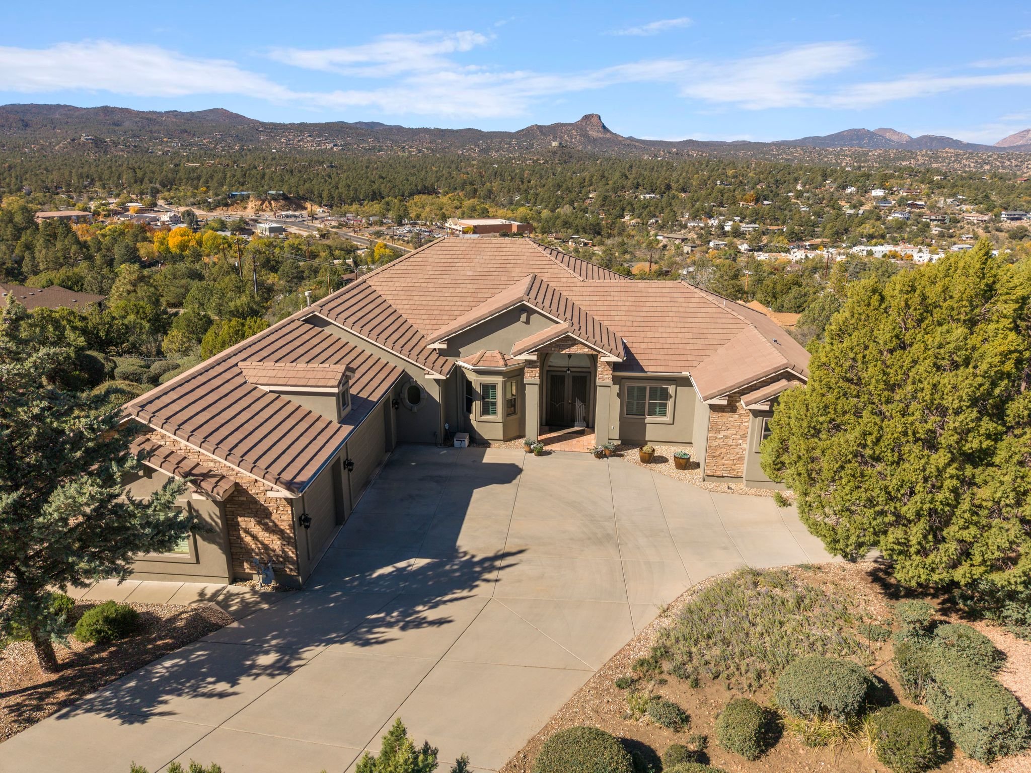 Aerial view of a Prescott home surrounded by pines