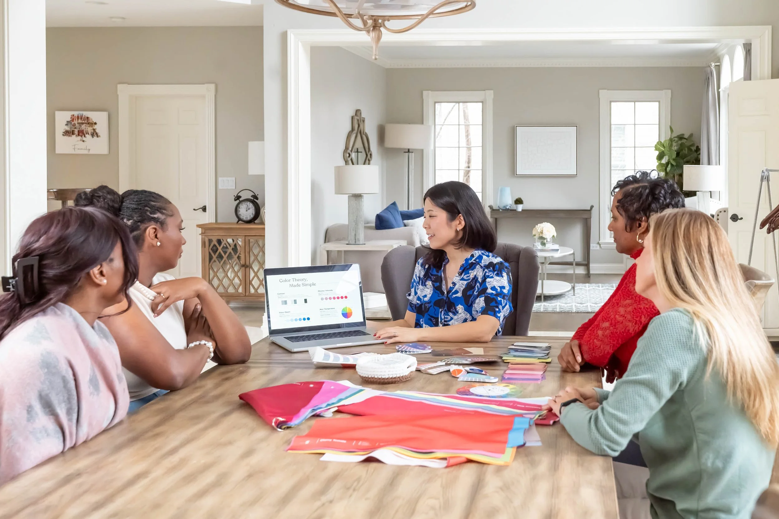 Corporate color analysis — group of professionals seated around a table