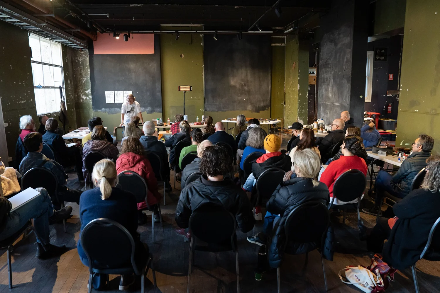 Richard Lloyd demonstrating furniture restoration techniques in Melbourne
