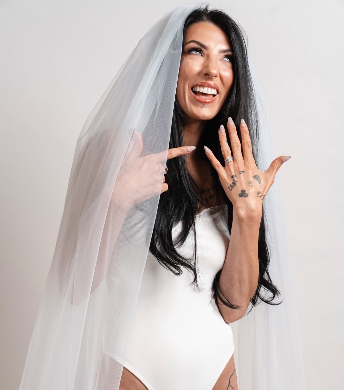Bride with bridal spray tan glow by The Glow Haven