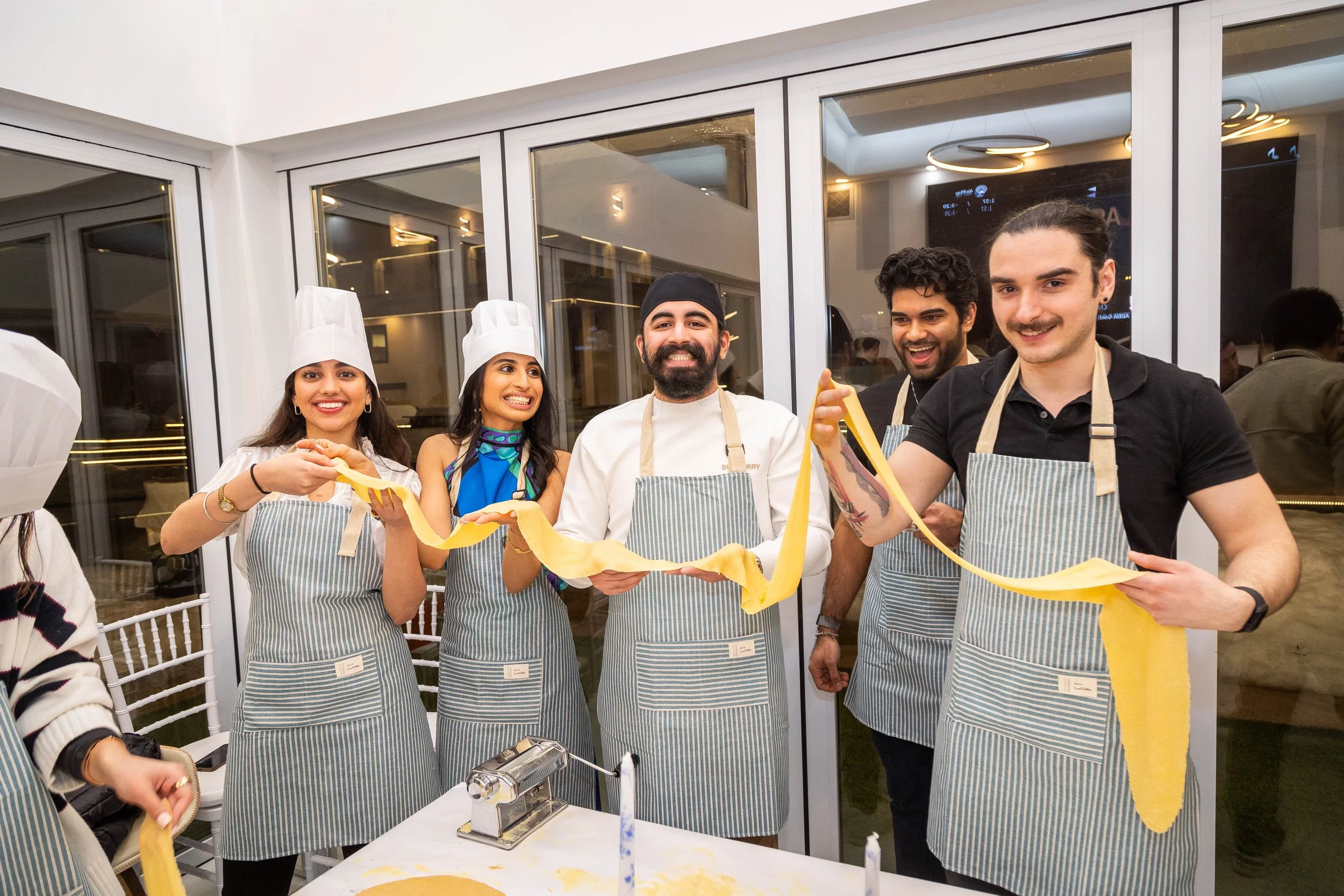 Pasta being shaped during a hands-on pasta class at home on Long Island