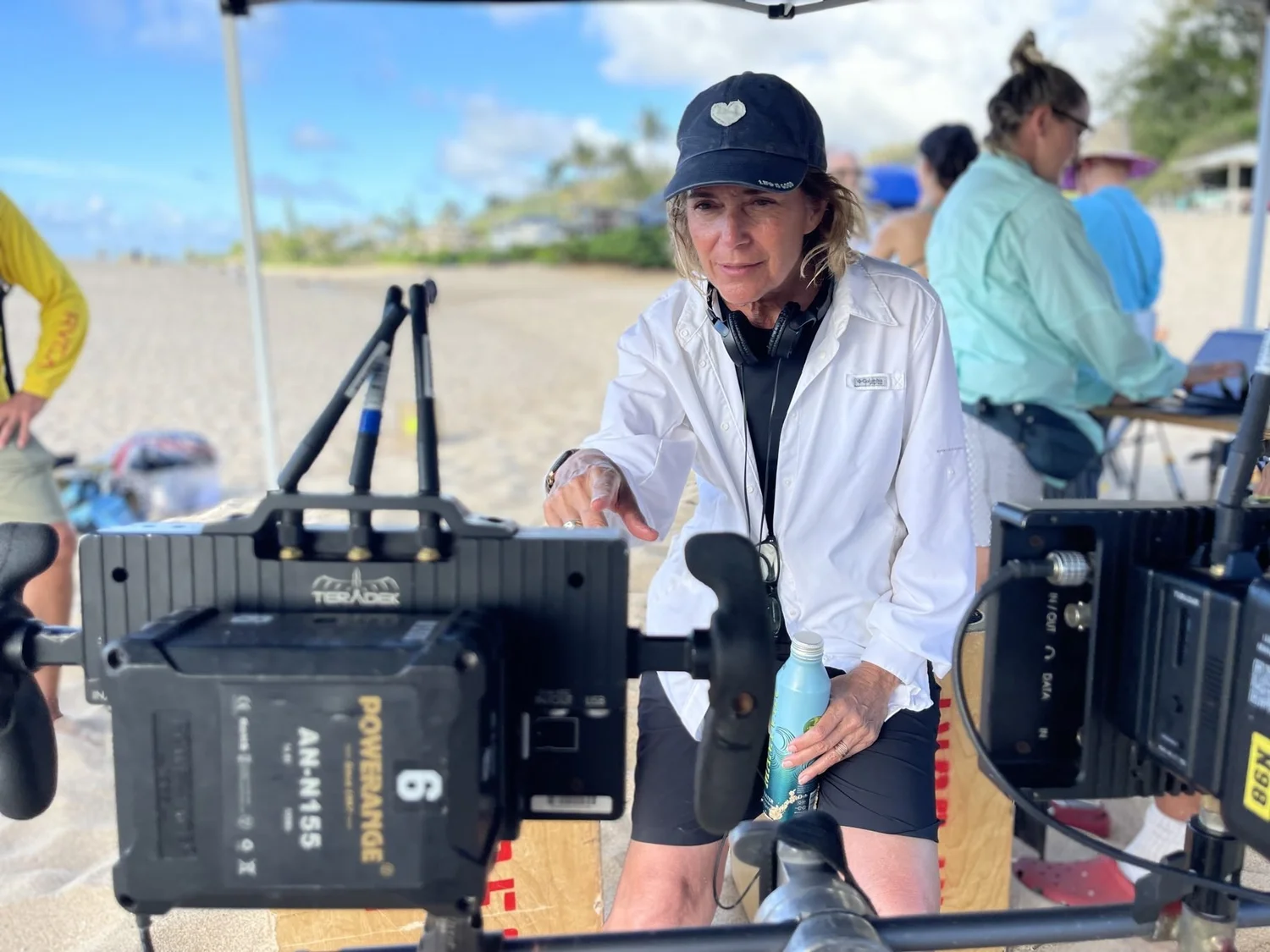 Andi Armaganian at the monitor on a beach location