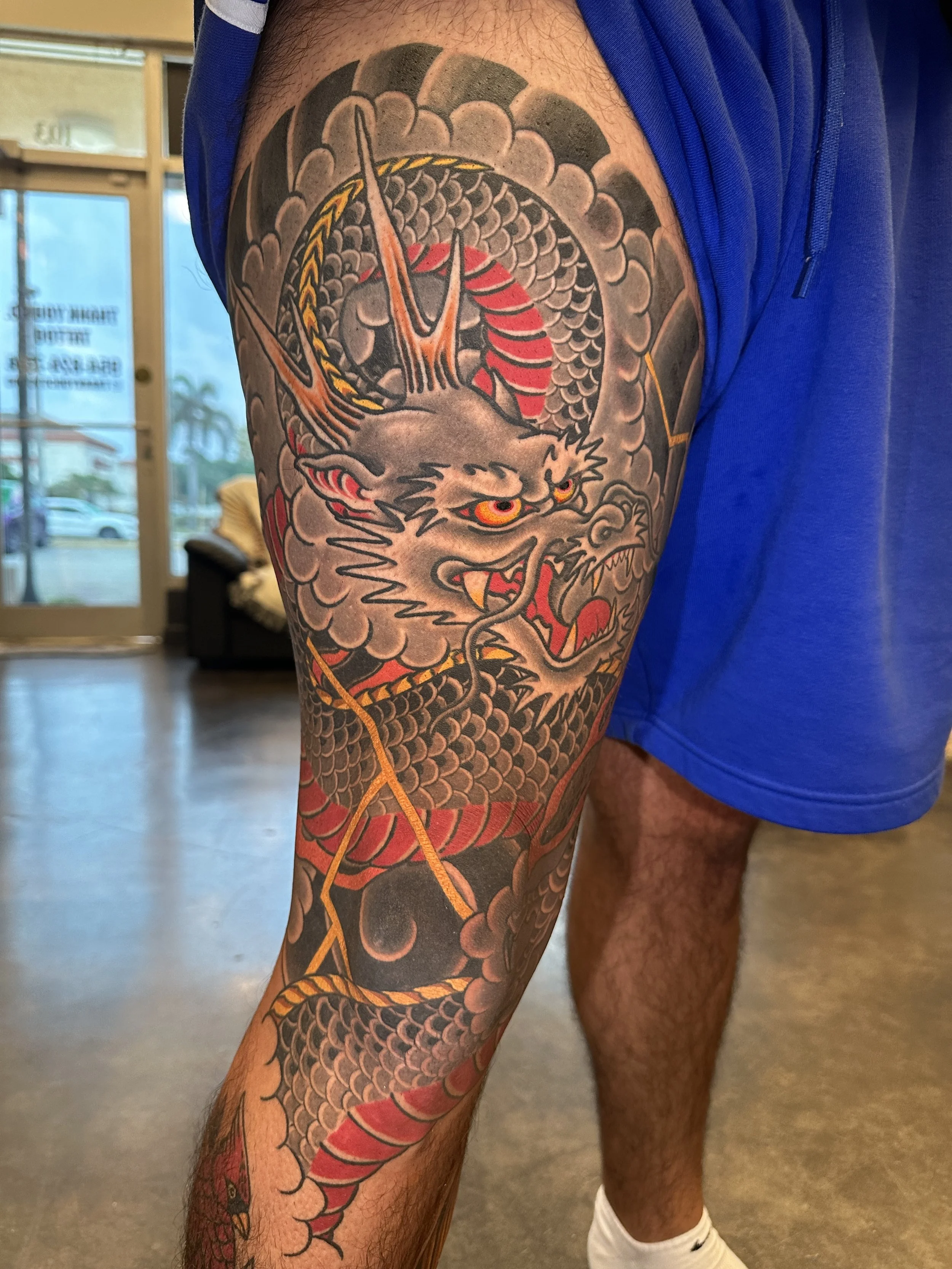 Dragon tattoo in color and black and grey Japanese style