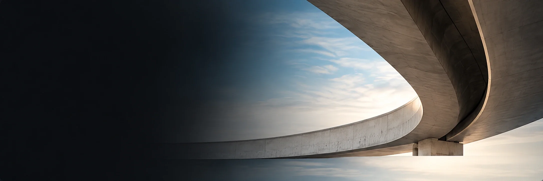 Illustrative architectural image of a sweeping concrete bridge; not a SmartCrete project photograph.