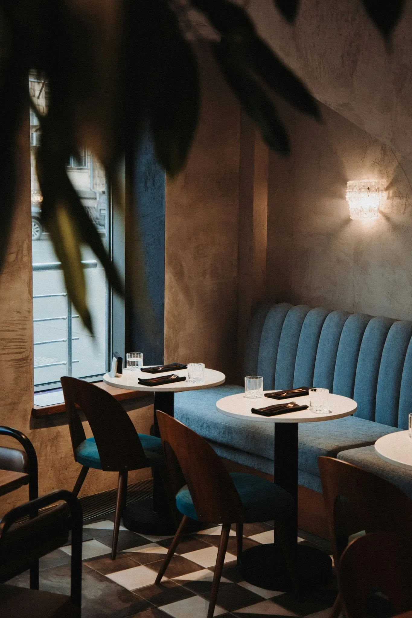 Intimate hospitality booth seating with warm considered lighting