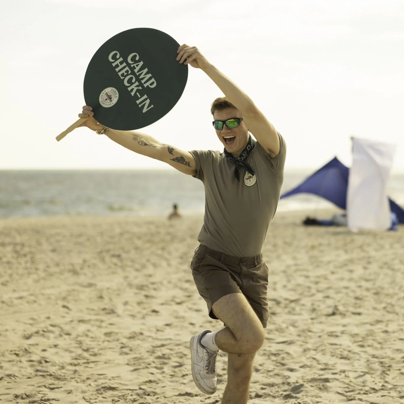 Pines Camp Counsel counselors on Fire Island Pines boardwalk