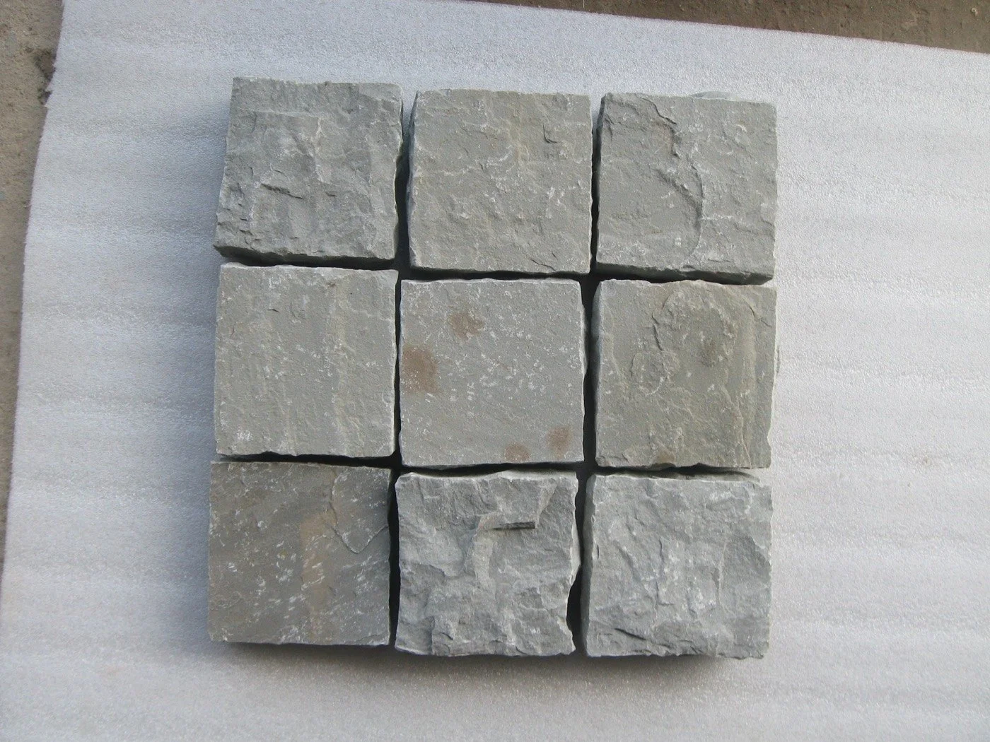 Wholesale Kandla Grey sandstone cobbles 6 by 6 inch commercial pallet shipping Jacksonville FL