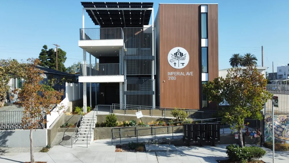 Street-front planting and trees at 3180 Imperial Ave, a multi-family building in San Diego