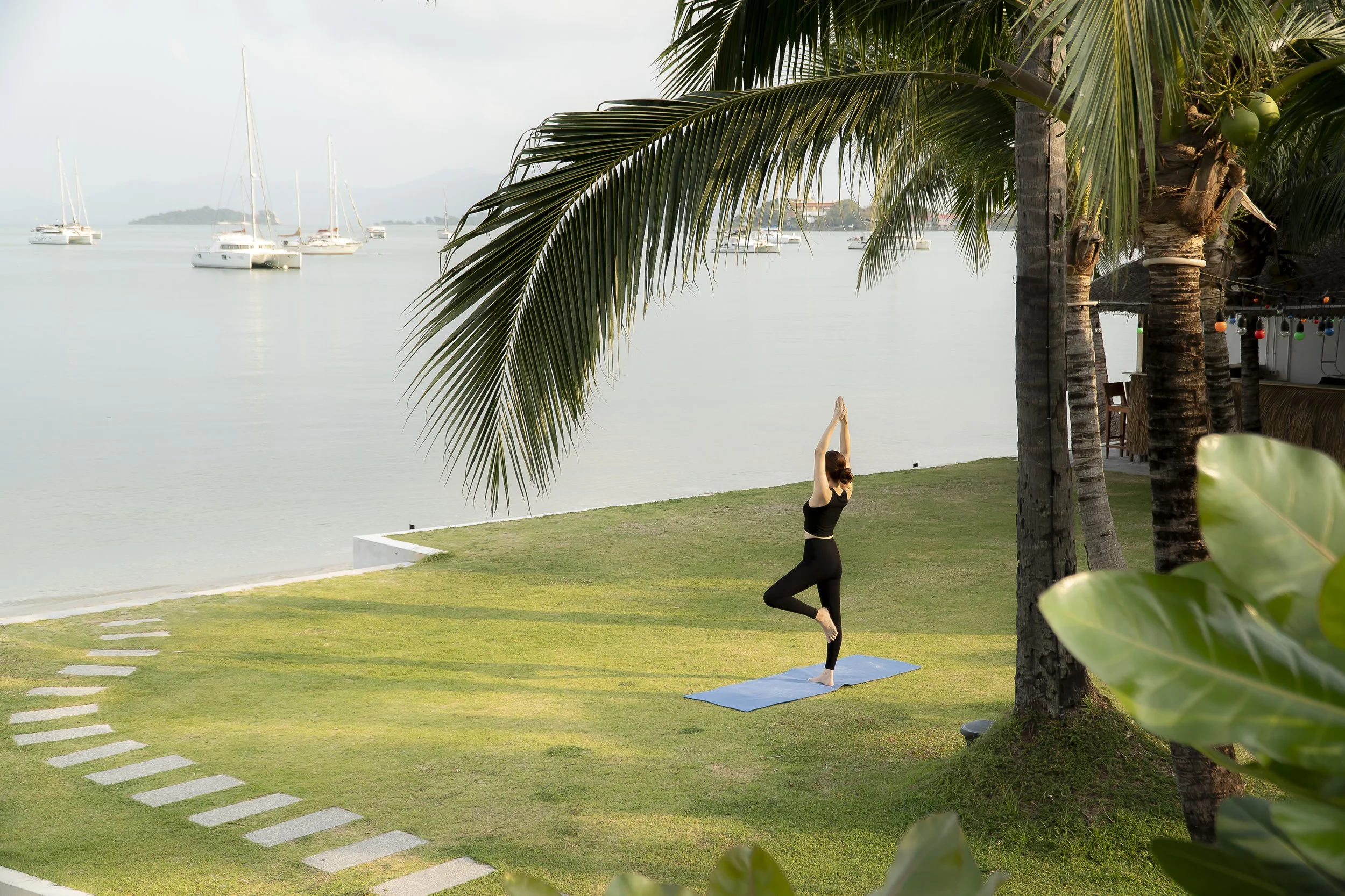 Private beachfront yoga session at sunrise, Bophut, Koh Samui