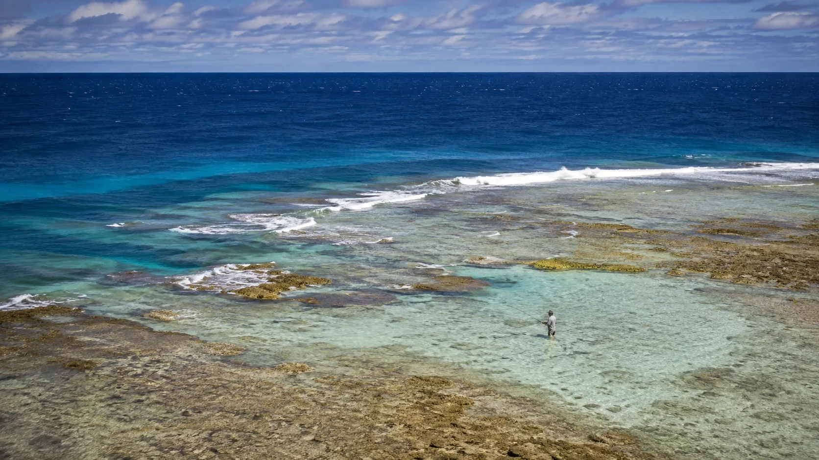 Seychelles giant trevally fly fishing water with reef flats, atoll edges and bluewater transitions