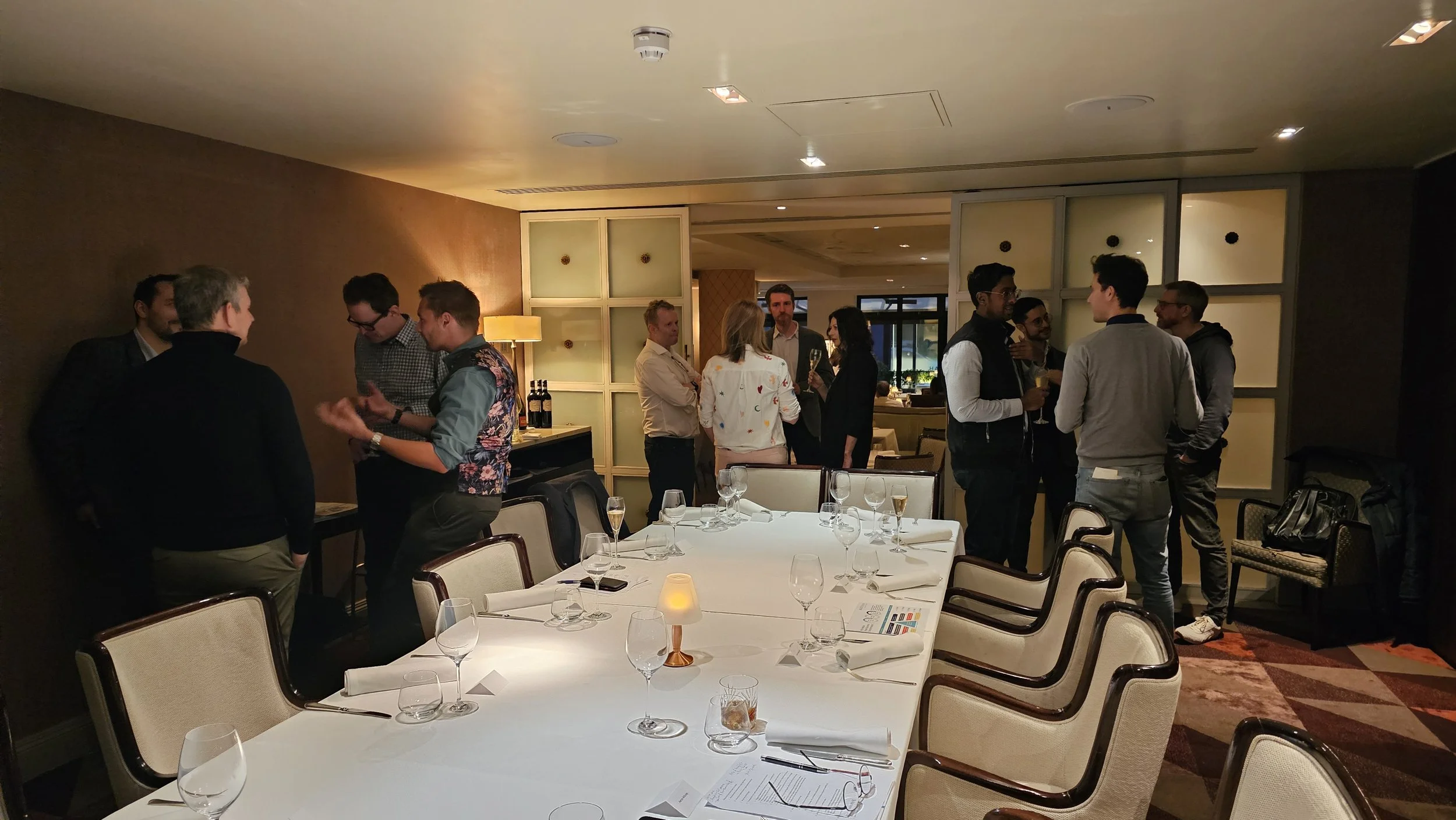 Guests gathering in the private dining room at Sartoria, Mayfair