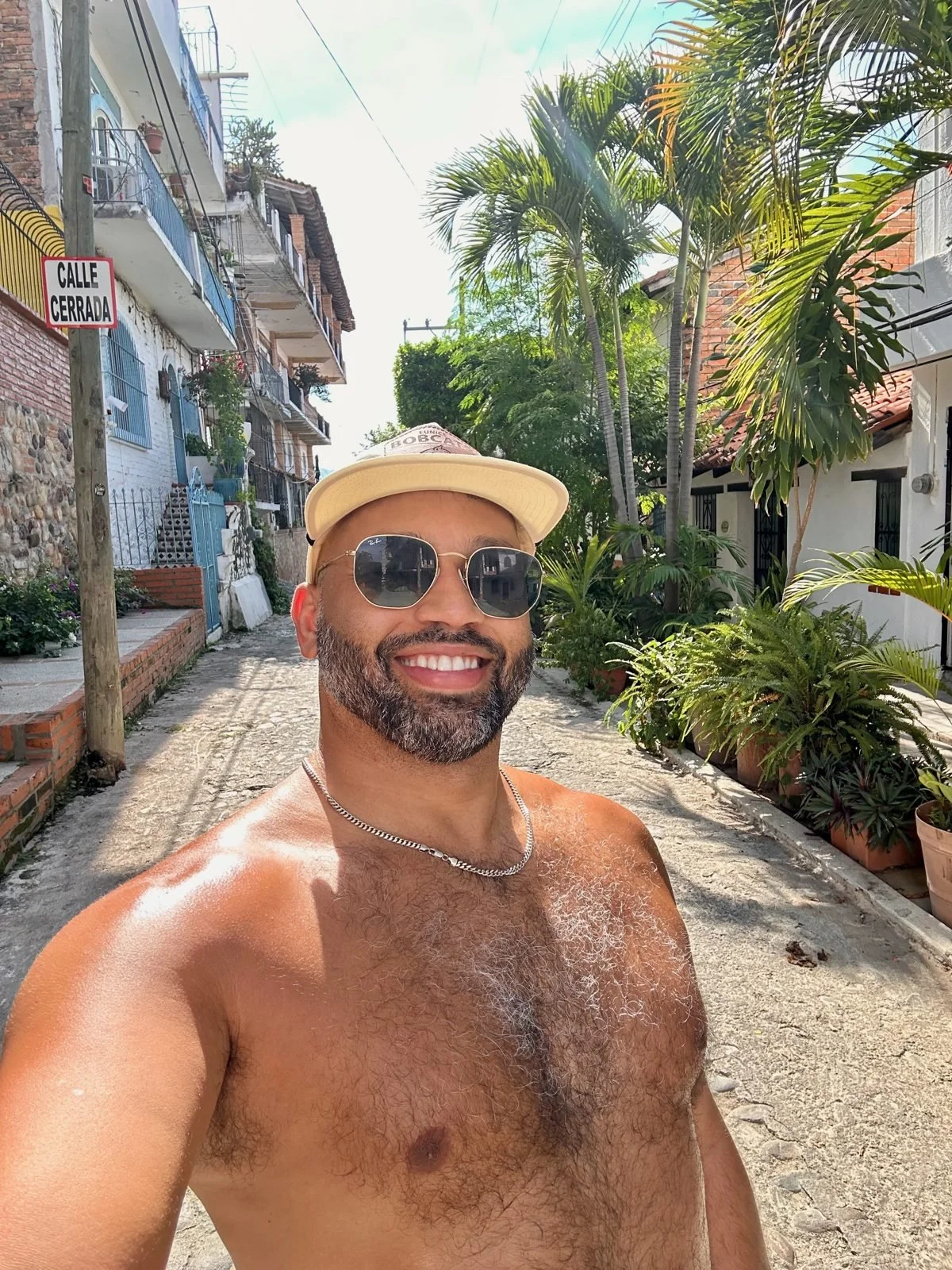 Black gay traveler on a street in the Zona Romántica, Puerto Vallarta