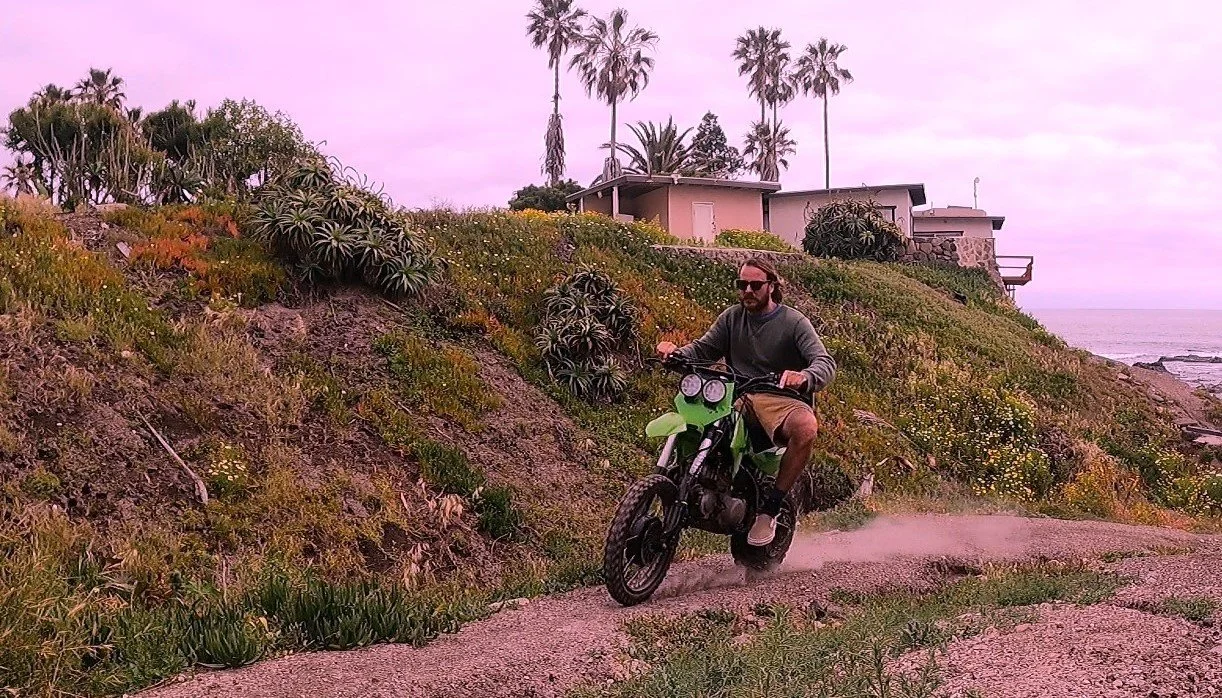 2WD motorcycle climbing uphill during field testing