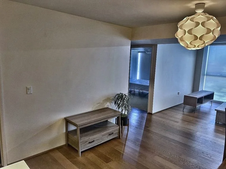 Fresh, cleared living room after move-out