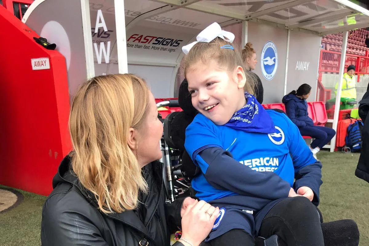Children playing football games together at a Forward Facing activity day