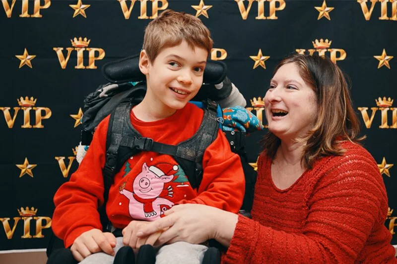 Families enjoying festive activities at the Forward Facing Christmas party