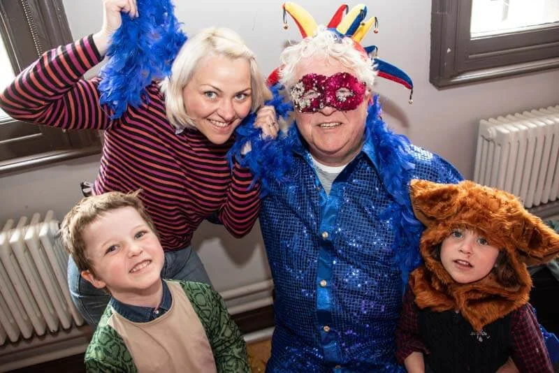 A family have fun dressing up at Memory Making Day