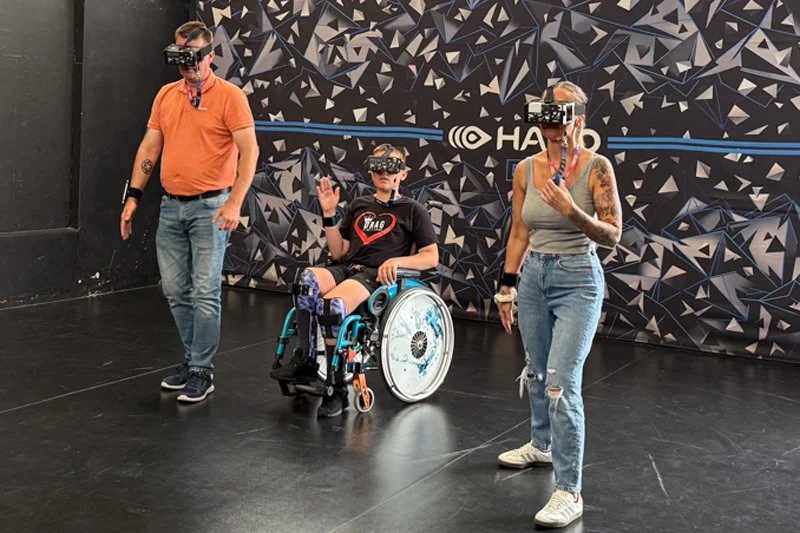 A family playing an adaptive HADO sport game at a Forward Facing event