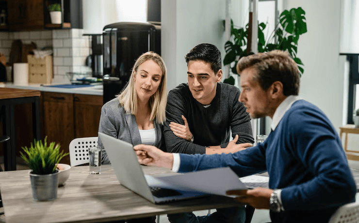 A family discussing fundraising assistance with an adviser