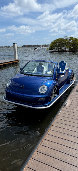 Blue VW Beetle jet car on the water