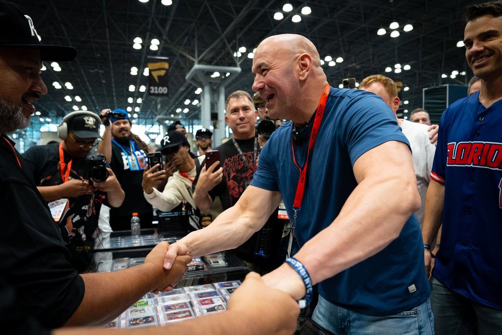 Handshake across a card show table