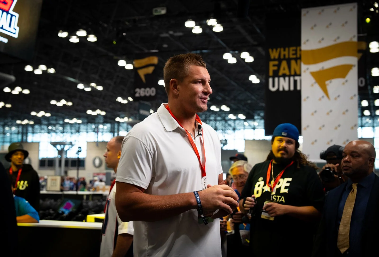 Guests talking on the card show floor