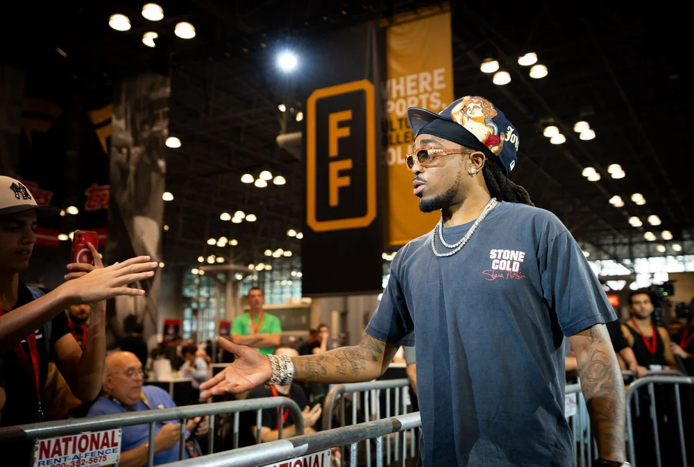 Athlete greeting fans at a card show