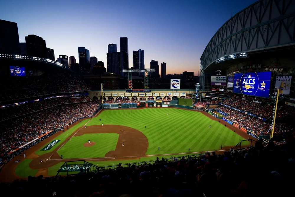 Houston ballpark at dusk with the skyline