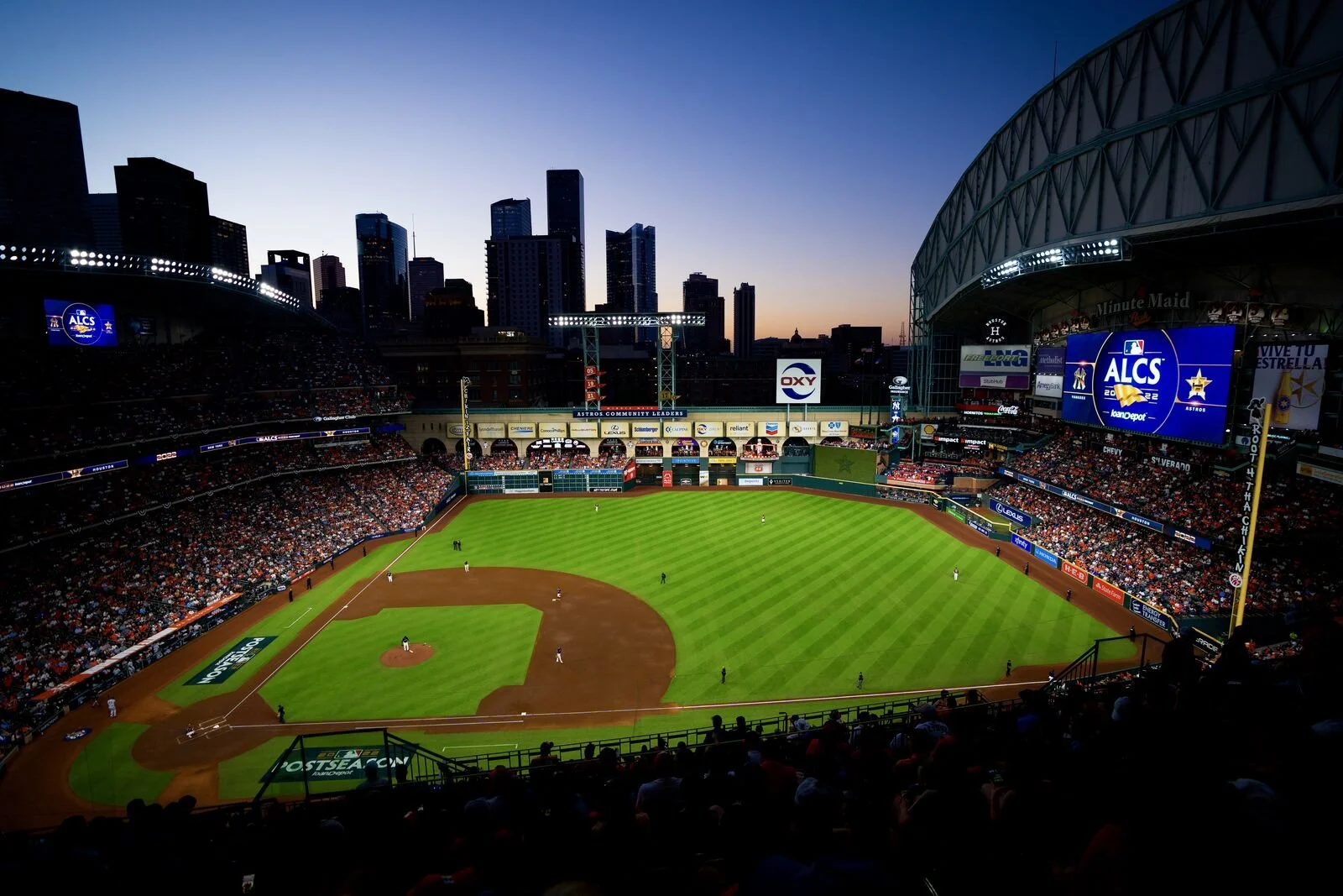 Houston ballpark at dusk with the skyline
