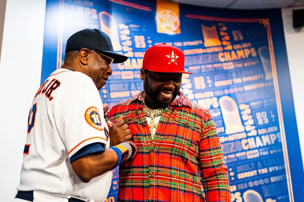 Two guests meeting in the Astros clubhouse