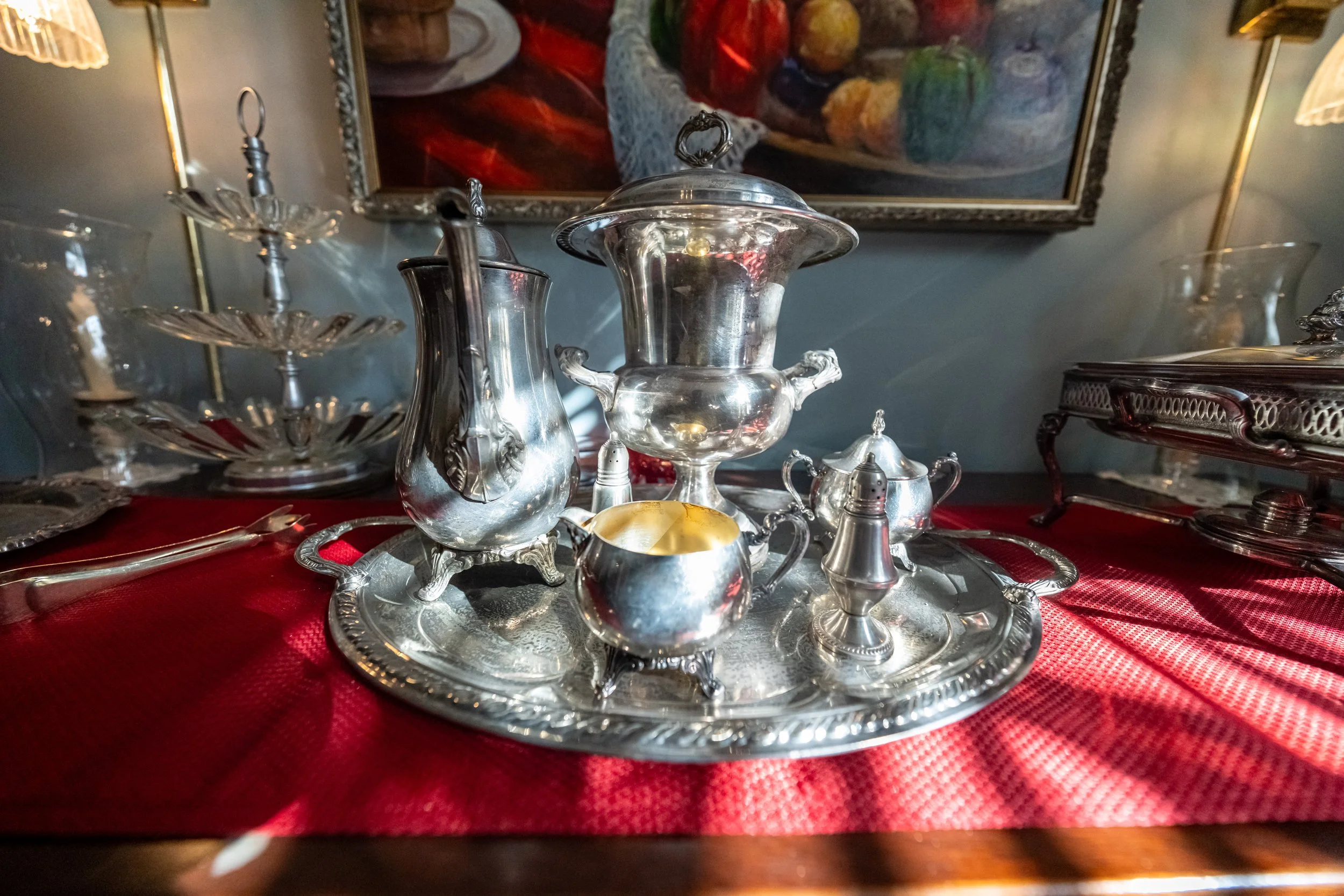 Antique piano with sheet music and metronome