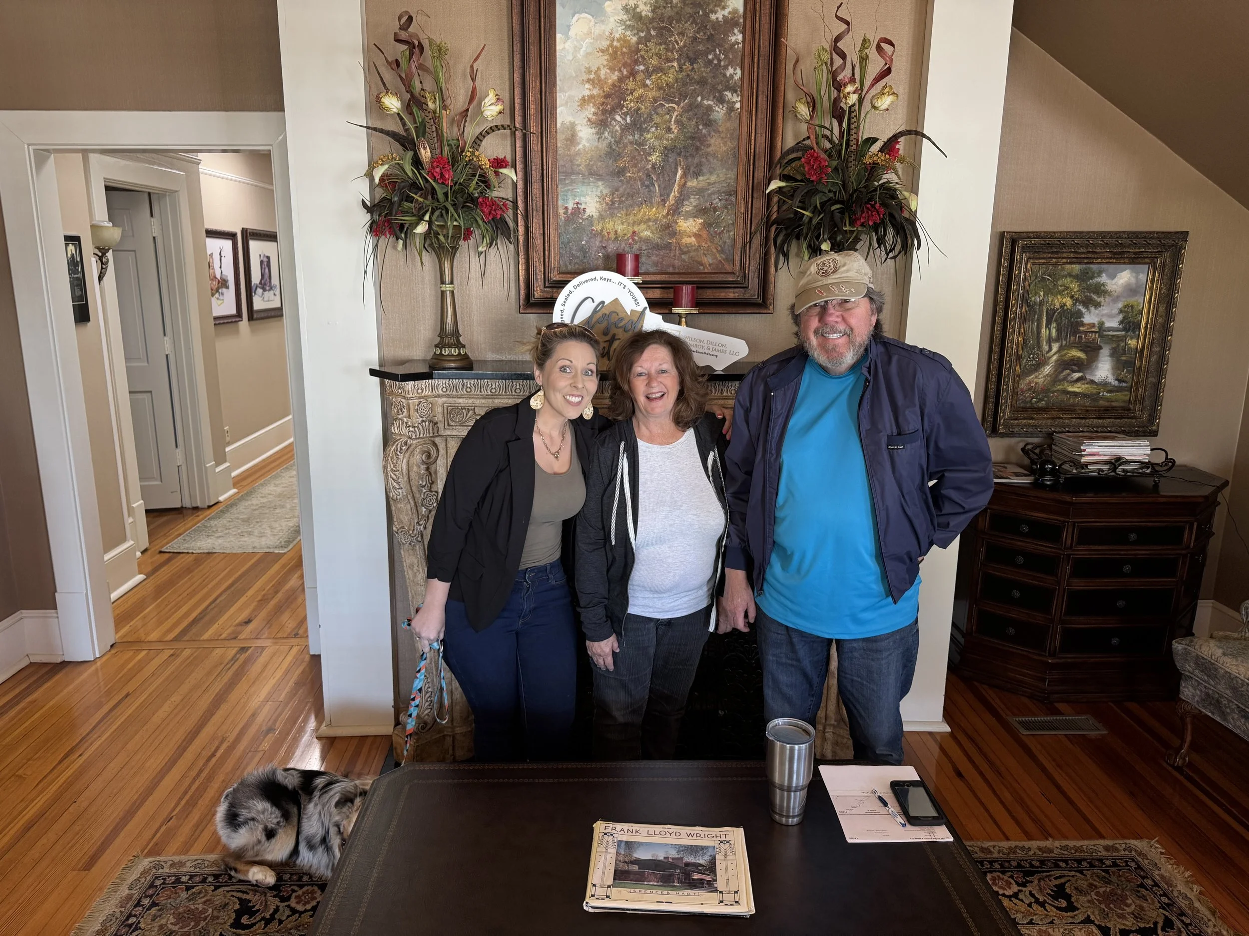 Nicole Kelley Real Estate – Jacksonville, AL – Repeat investor clients celebrating another successful home sale at closing.