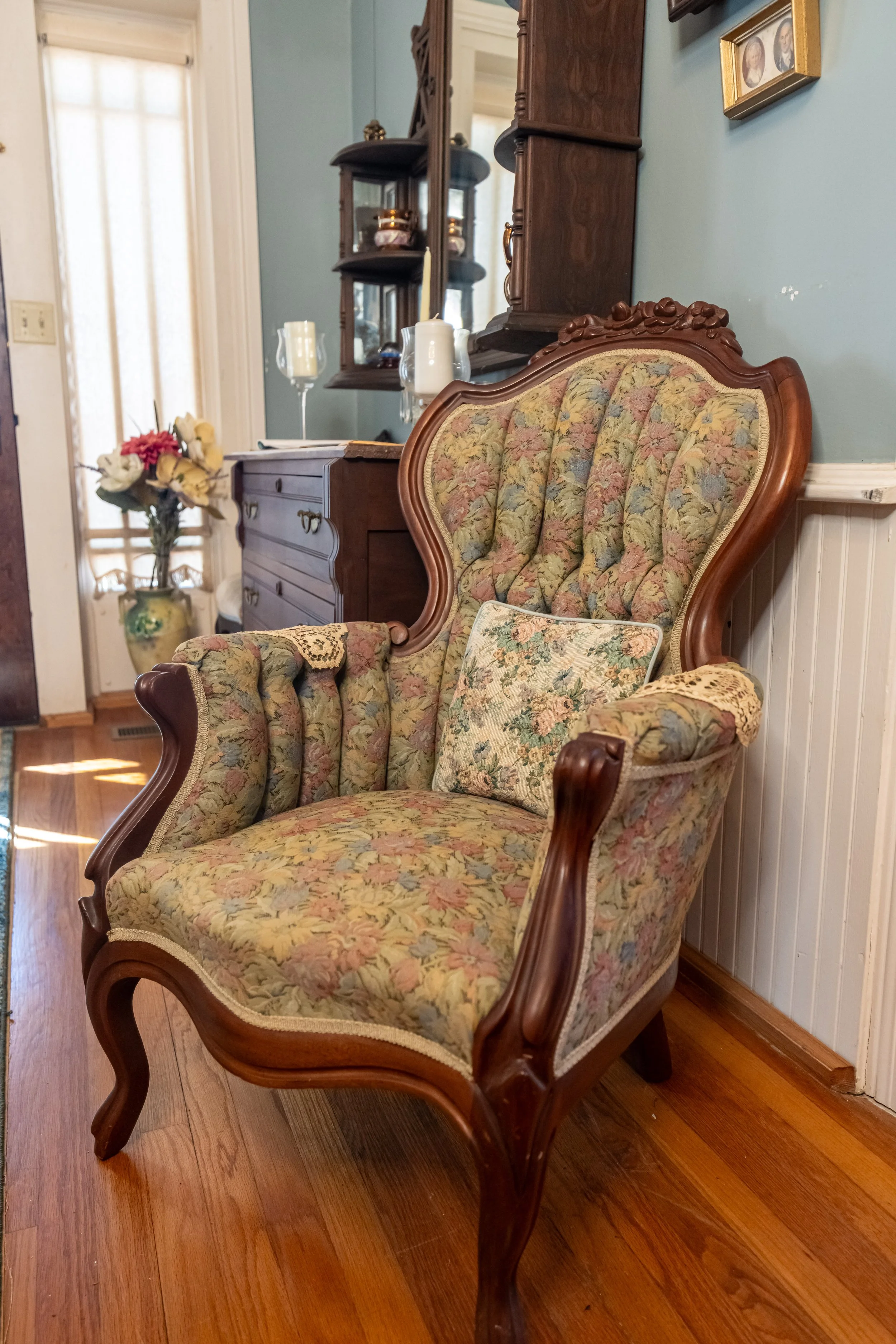 Antique piano with sheet music and metronome