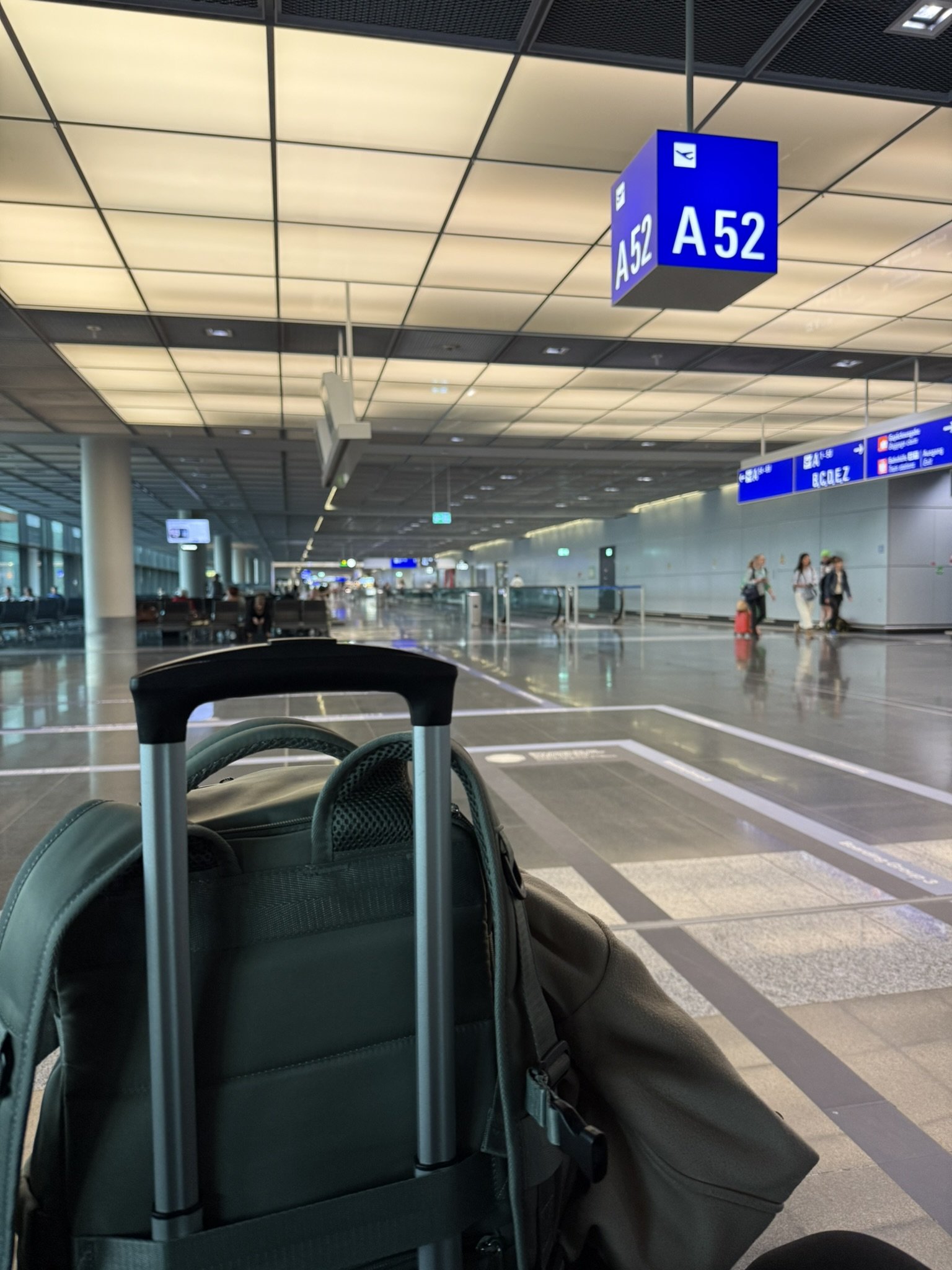 Waiting at the airport with luggage