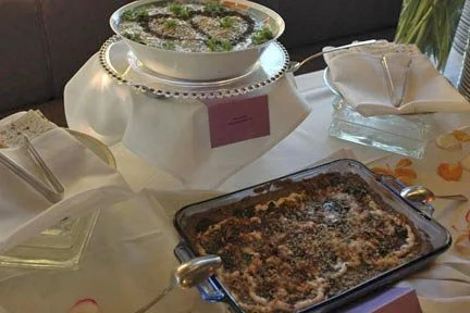 Buffet table featuring ethnic fusion Swiss and Iranian cuisine