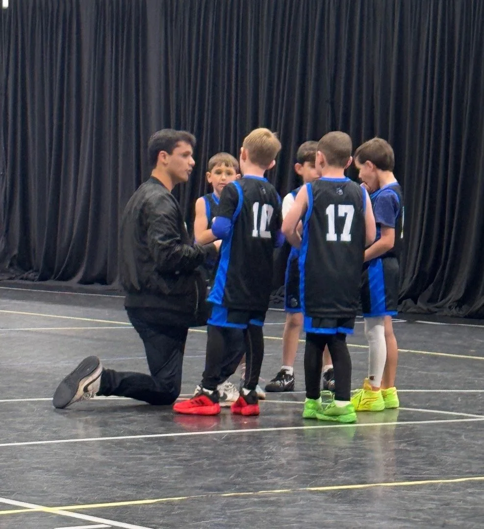 Coach Darien Gonzalez on the sideline