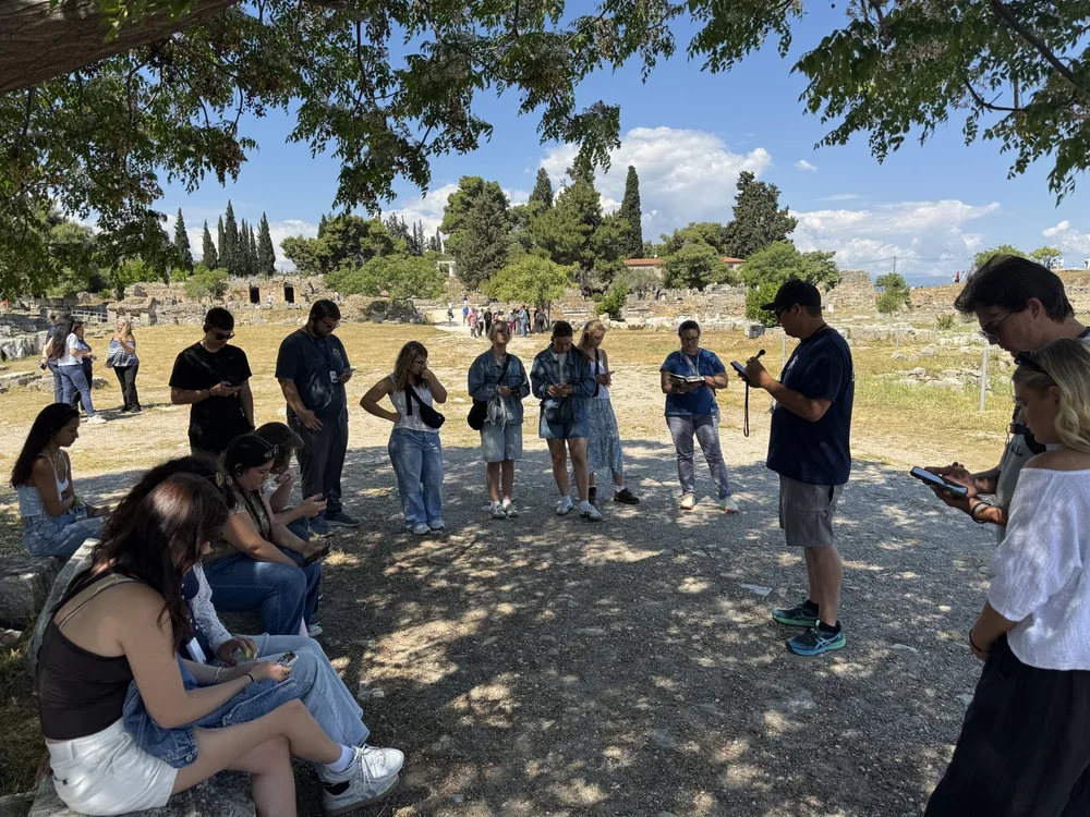 One-Year Bible Program students studying Scripture at ancient Corinth