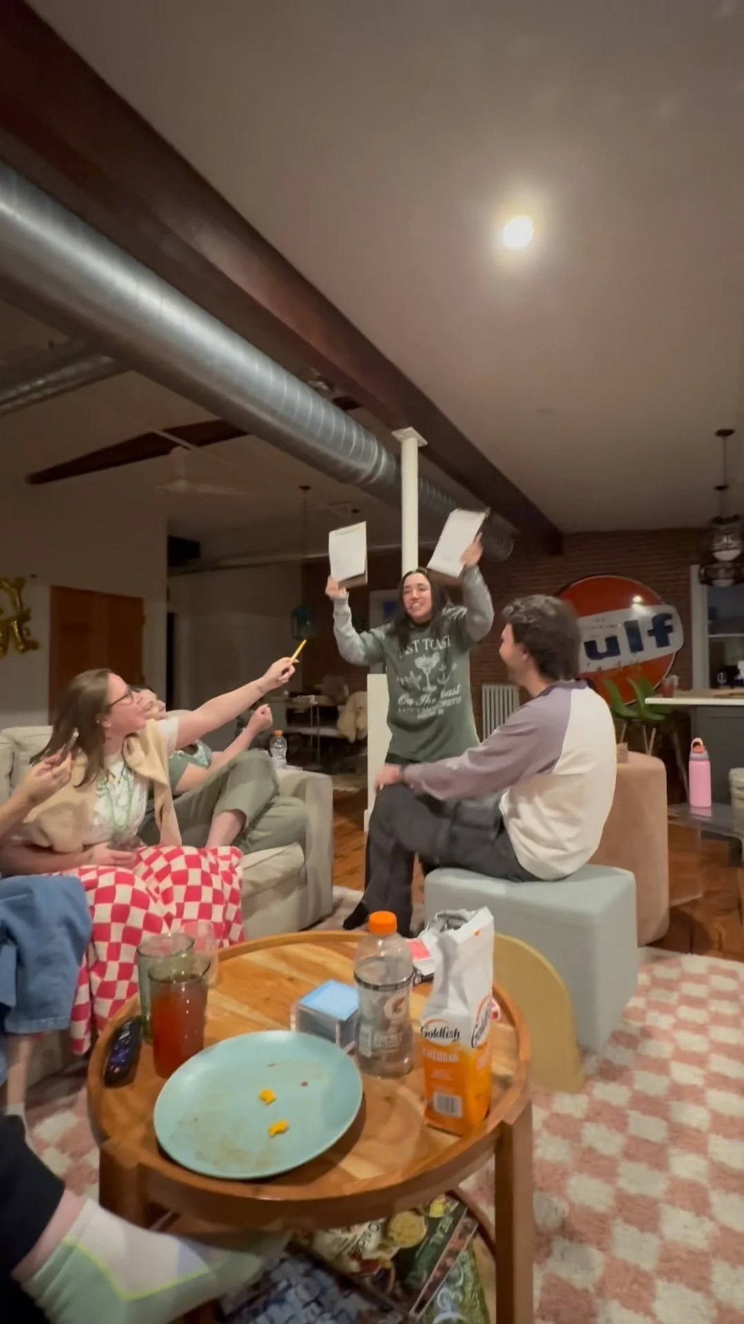 Guests laughing and reacting to Rhode Island magician and Boston magician Ben Travelyn at a bachelorette party