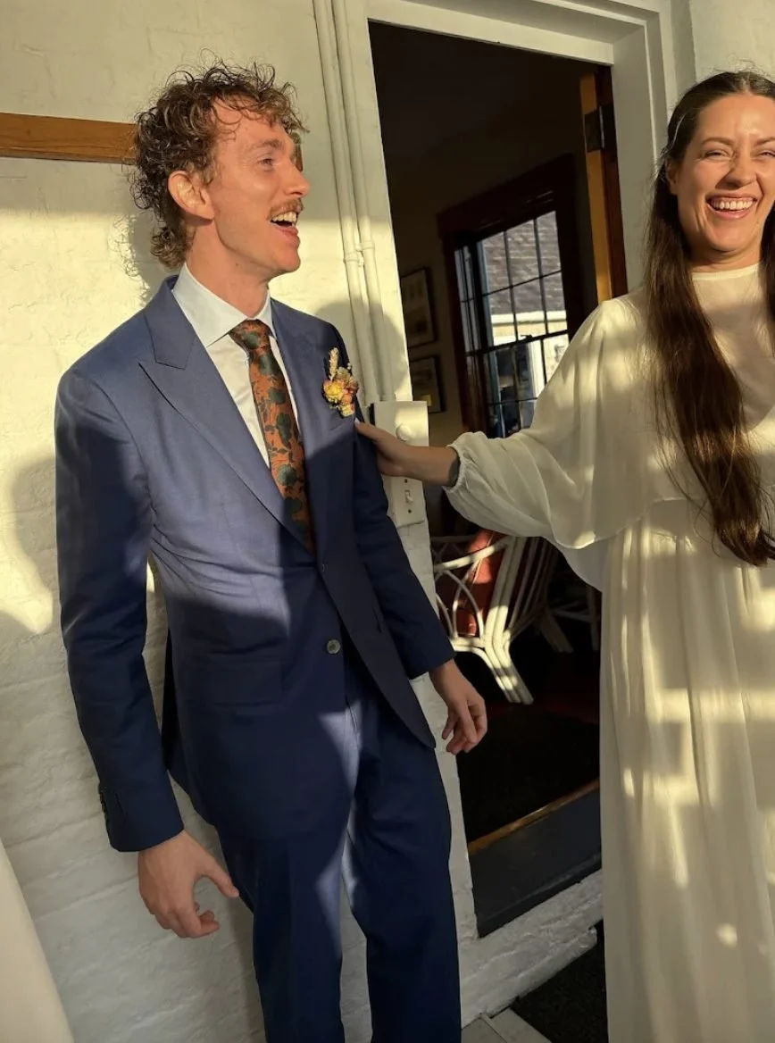 Bride and groom laughing during a Rhode Island wedding magician performance