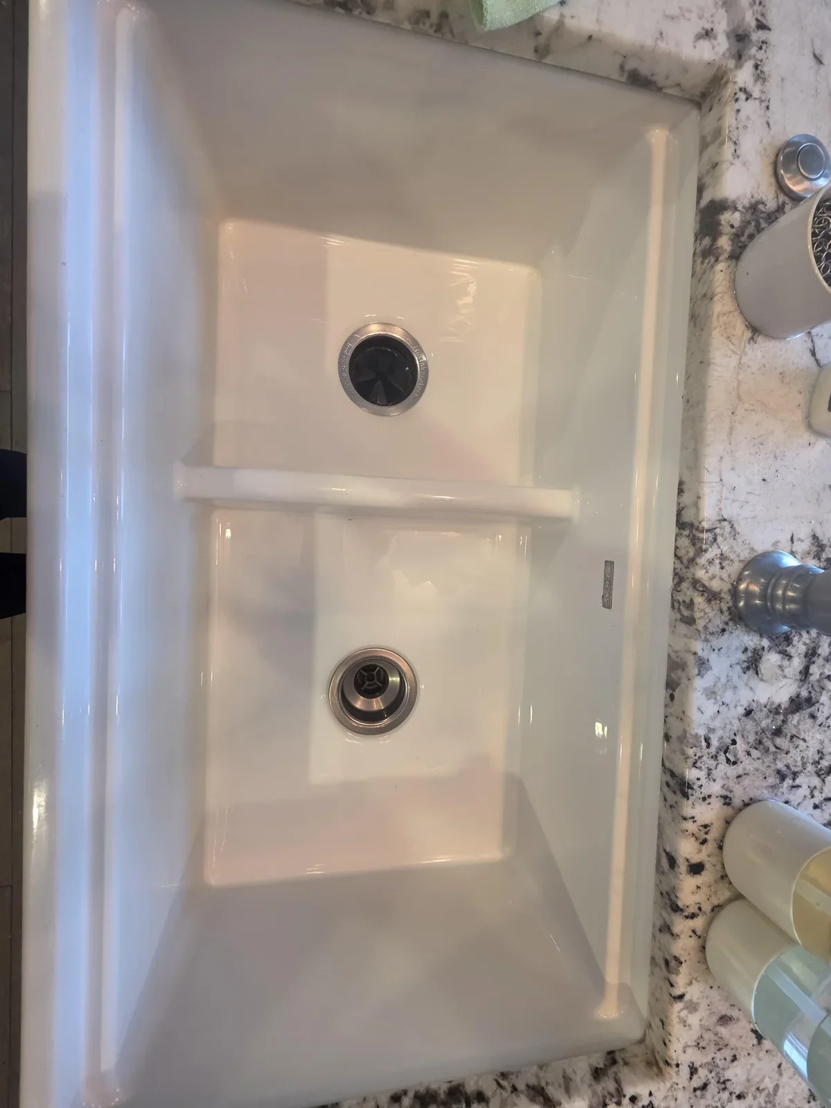 The same double-basin kitchen sink with clear basins and cleaner drain surrounds