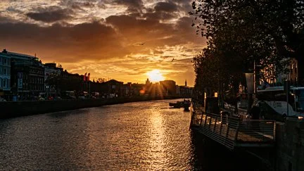 Sunset over the River Liffey from O'Connell Bridge, Dublin — street photography by Billy Smith