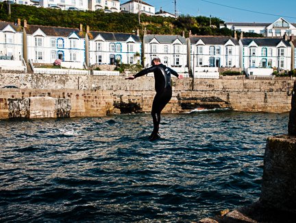 Harbour jumping at Porthleven, Cornwall — street photography by Billy Smith
