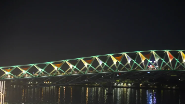 Close view of the illuminated steel truss of Atal Bridge