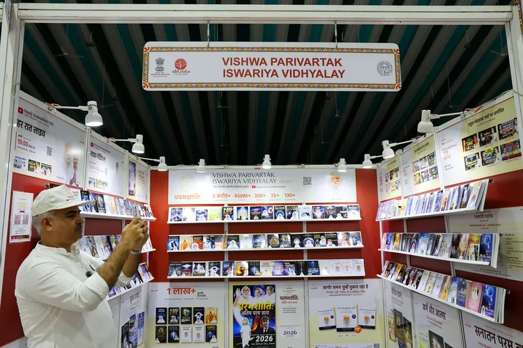 A volunteer photographs the fully stocked stall