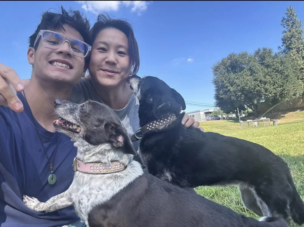 Mika Roland with her son and their two dogs